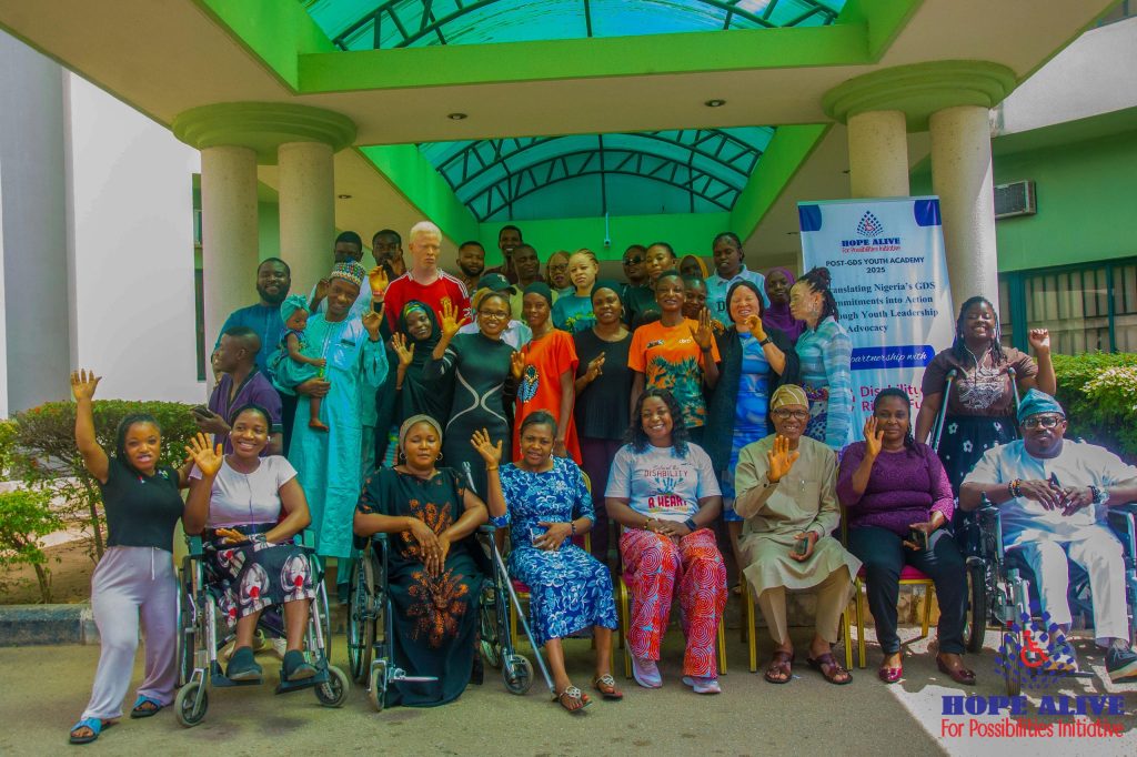 joyful group picture of persons with disabilities
